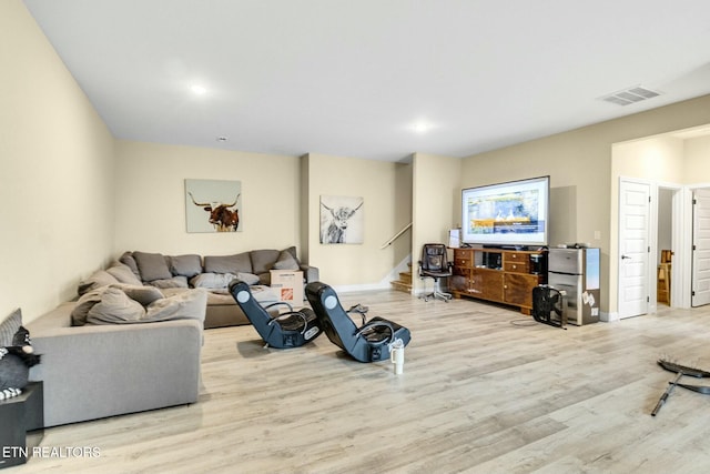 living room with light wood-type flooring