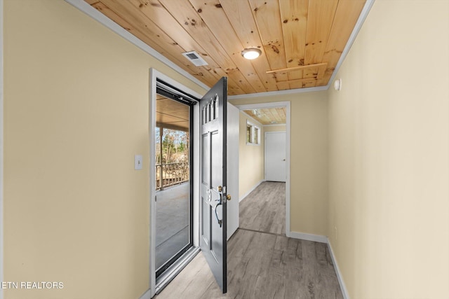 hallway with wooden ceiling and light hardwood / wood-style flooring