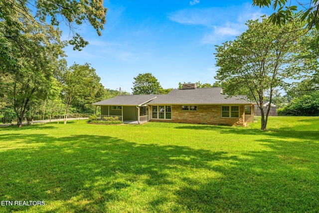 19 Shawnee Trl, Athens, TN 37303 - rear view of property featuring a yard and a chimney