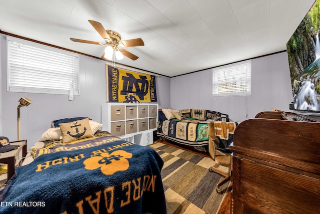 carpeted bedroom with ceiling fan