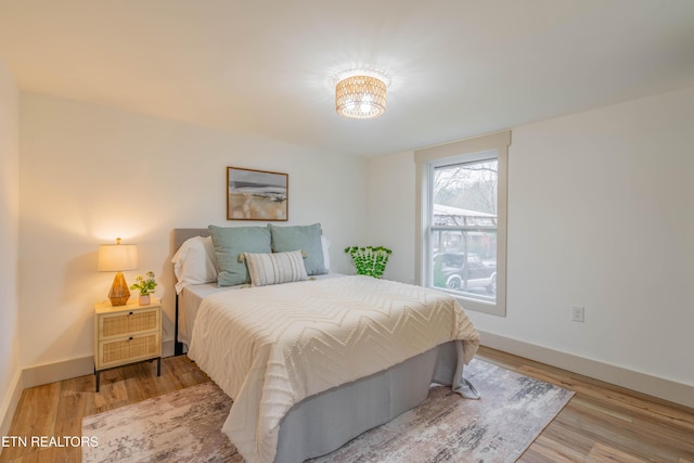 bedroom featuring light hardwood / wood-style floors