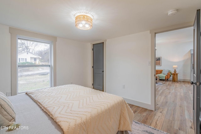 bedroom featuring light hardwood / wood-style floors