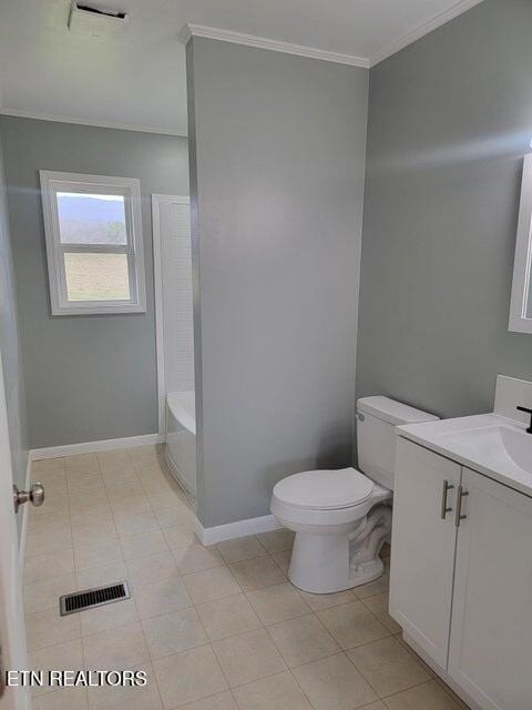 full bathroom featuring crown molding, vanity, bathtub / shower combination, tile patterned floors, and toilet