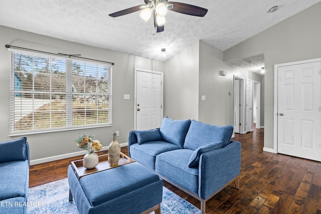 living room with a textured ceiling, lofted ceiling, dark hardwood / wood-style floors, and ceiling fan