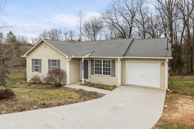 single story home featuring a garage