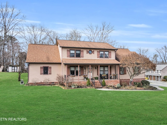 view of front of home featuring a front lawn and a porch