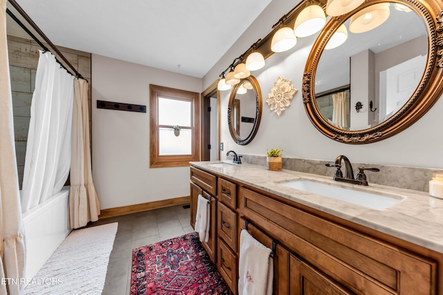 bathroom featuring vanity, tile patterned flooring, and shower / bath combo