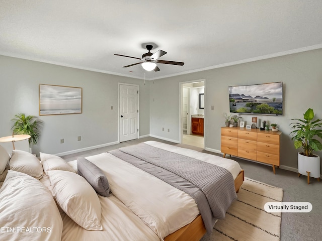 bedroom with ensuite bath, carpet floors, ornamental molding, and ceiling fan