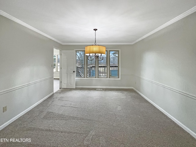 unfurnished dining area with ornamental molding and carpet flooring