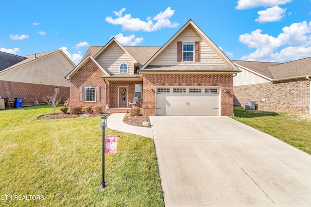 view of front of home with a garage, central AC unit, and a front yard