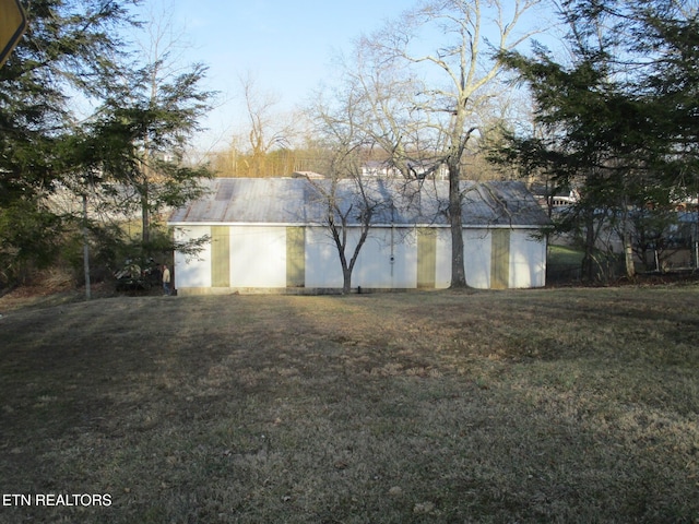 garage with a yard