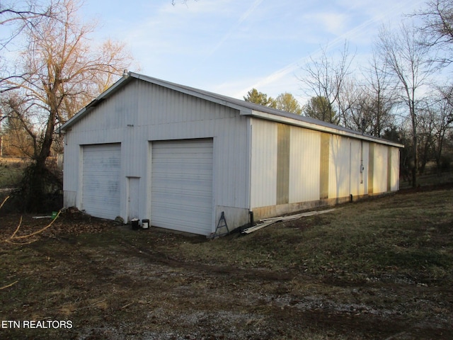 view of outbuilding with a garage