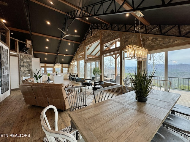550 Steer Creek Rd, Tellico Plains, TN 37385 - interior space with hardwood / wood-style floors, a notable chandelier, and high vaulted ceiling