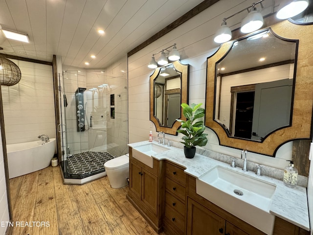 550 Steer Creek Rd, Tellico Plains, TN 37385 - full bathroom with vanity, wood-type flooring, wooden ceiling, shower with separate bathtub, and toilet