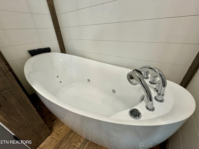 550 Steer Creek Rd, Tellico Plains, TN 37385 - details with wood-type flooring and a bathtub