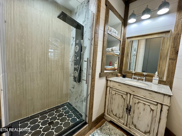 550 Steer Creek Rd, Tellico Plains, TN 37385 - bathroom with vanity, a shower with door, and tile walls