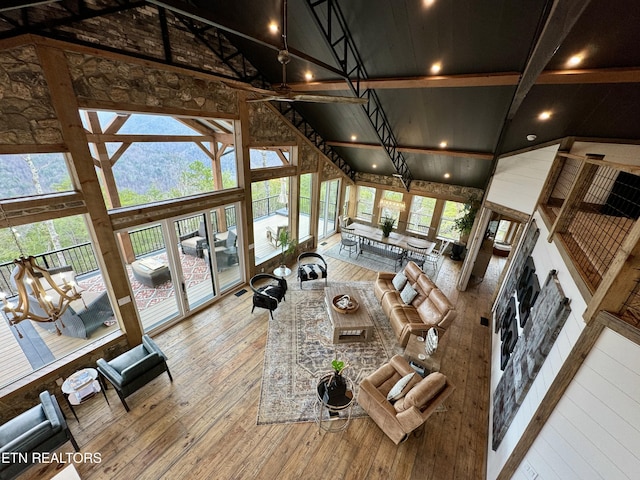 550 Steer Creek Rd, Tellico Plains, TN 37385 - living room with beamed ceiling, wood-type flooring, high vaulted ceiling, and a wealth of natural light