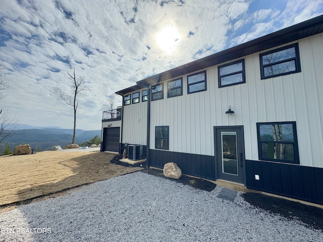 550 Steer Creek Rd, Tellico Plains, TN 37385 - exterior space featuring a mountain view, a garage, a balcony, and central air condition unit