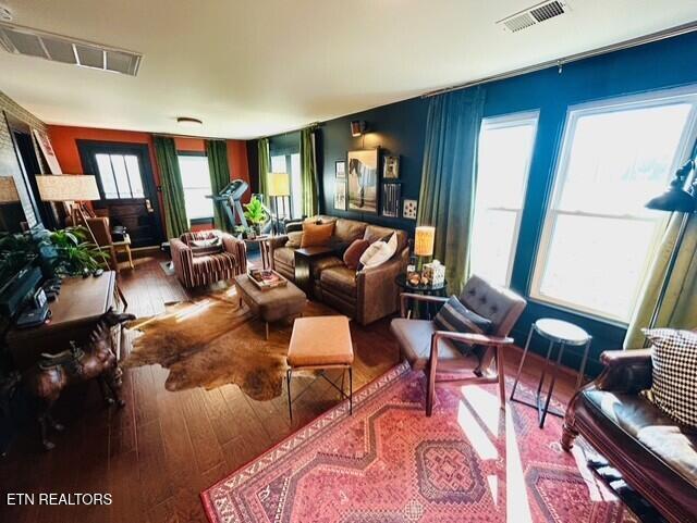 living room with hardwood / wood-style flooring