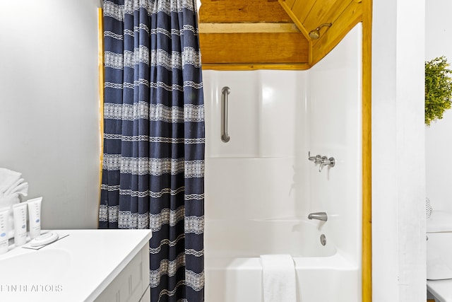 bathroom with vanity and shower / bath combo with shower curtain