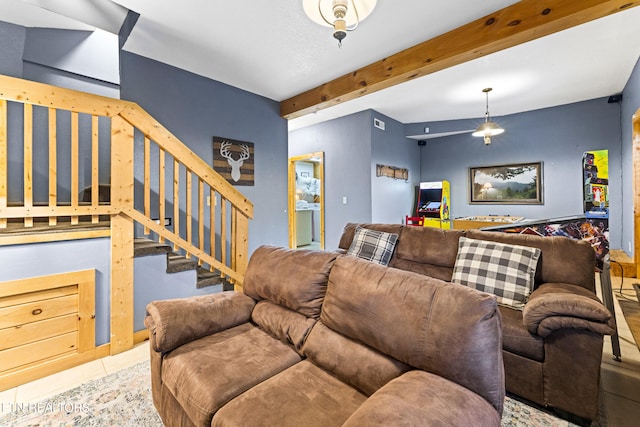 tiled living room with beam ceiling