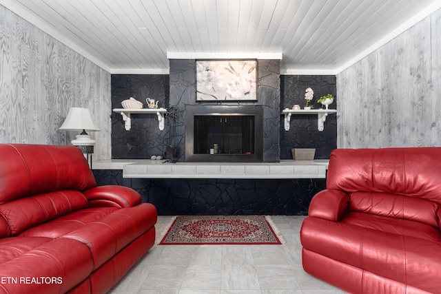 living room featuring crown molding and wooden ceiling