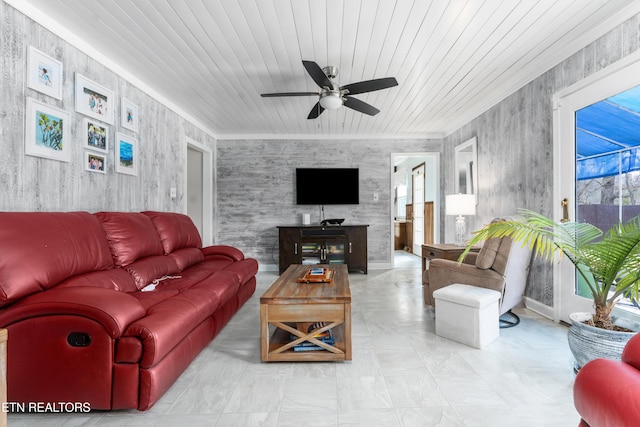 living room featuring ornamental molding, wooden ceiling, and ceiling fan