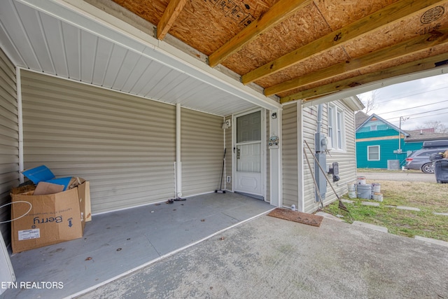 view of patio featuring a carport