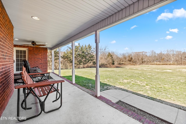 view of patio / terrace featuring ceiling fan