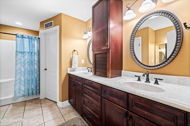 bathroom featuring vanity and tile patterned flooring