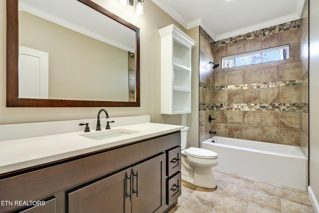 full bathroom with tiled shower / bath, vanity, crown molding, and toilet