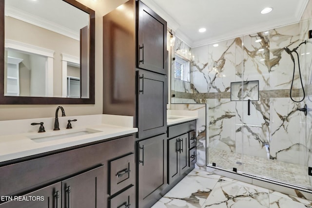 bathroom featuring ornamental molding, an enclosed shower, and vanity