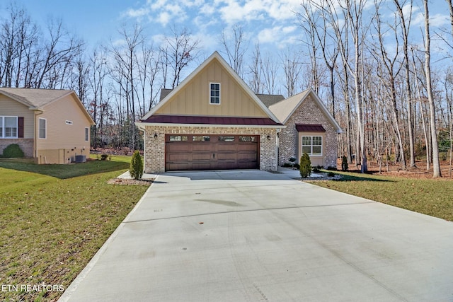 view of front of property with a garage, central AC unit, and a front lawn