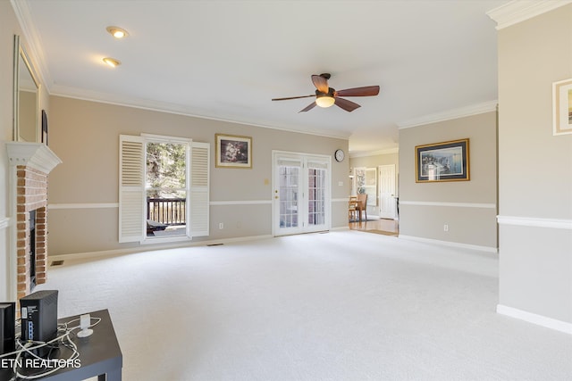 living room with crown molding, ceiling fan, and light carpet