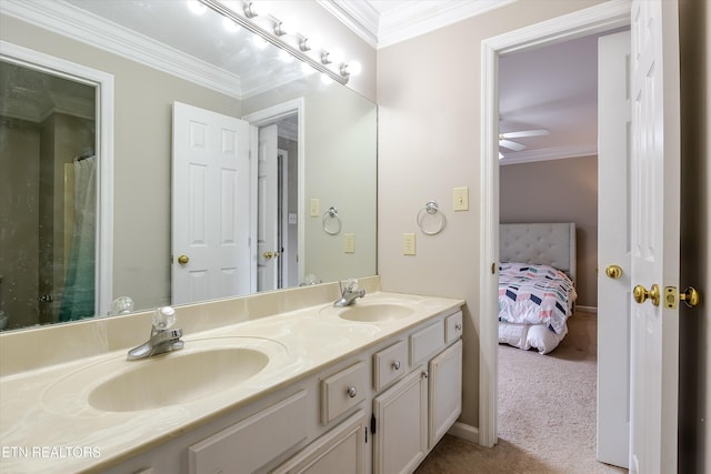 bathroom with ceiling fan, ornamental molding, and vanity