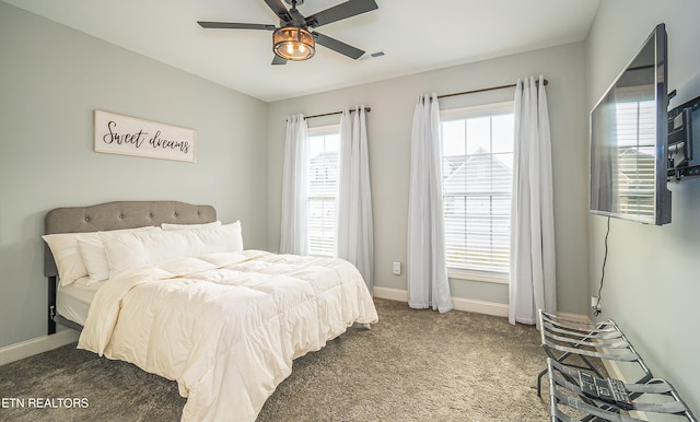 carpeted bedroom featuring ceiling fan