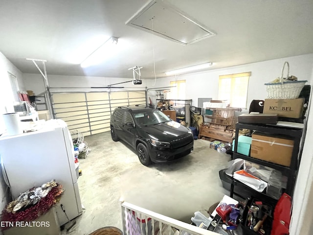 5001 Cheyenne Dr, Crossville, TN 38572 - garage featuring a garage door opener