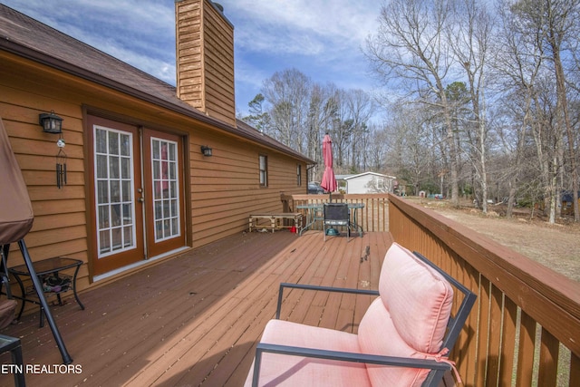 wooden deck with french doors