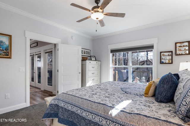 bedroom featuring crown molding, carpet floors, and ceiling fan