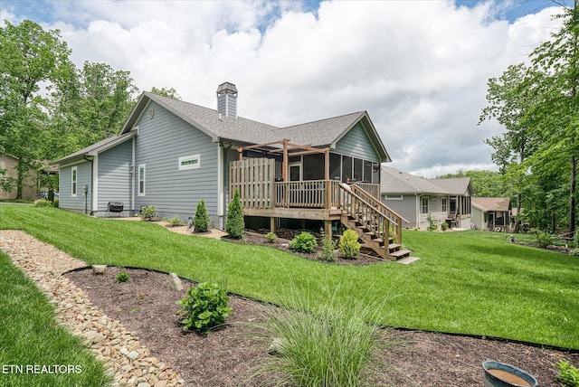 197 Cappshire Rd, Crossville, TN 38558 - rear view of house featuring a sunroom, a chimney, a yard, stairs, and a shingled roof