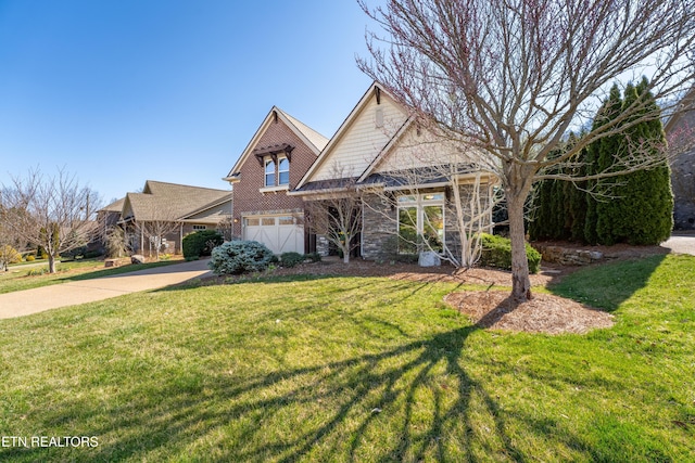 view of front facade featuring a garage, stone siding, concrete driveway, and a front yard