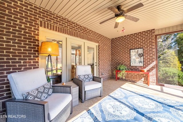 view of patio featuring an outdoor hangout area and a ceiling fan