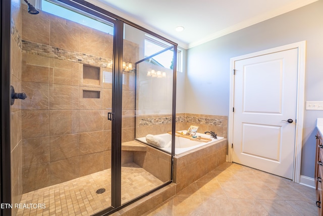 full bathroom with vanity, a stall shower, ornamental molding, and a bath