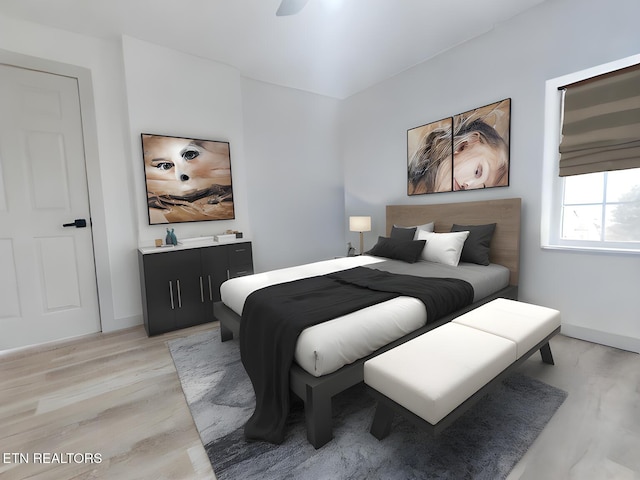 bedroom featuring light wood-type flooring