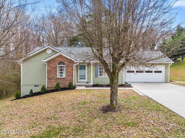 ranch-style house with a garage and a front lawn