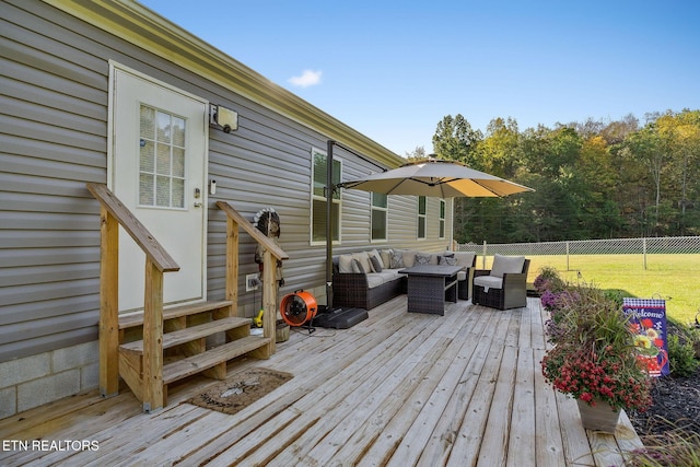 wooden deck with an outdoor hangout area