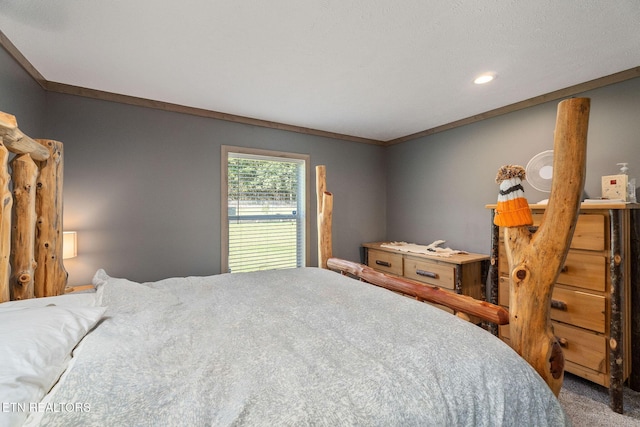 carpeted bedroom featuring crown molding