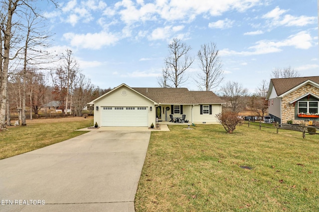 single story home with a garage and a front lawn