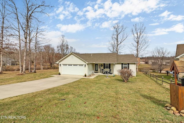 ranch-style house with a garage and a front yard