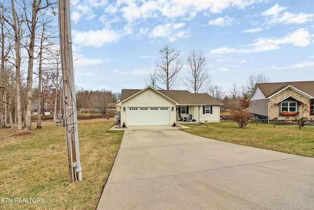 single story home with a garage and a front yard